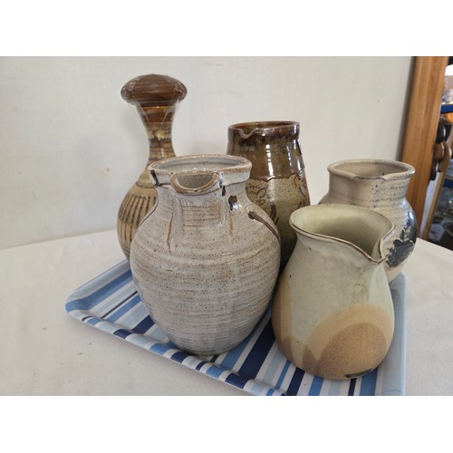 64 - Five various studio pottery jugs and vases