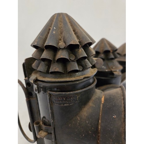 126 - Four vintage police handheld carbide lamps incl. Hetherington & Co