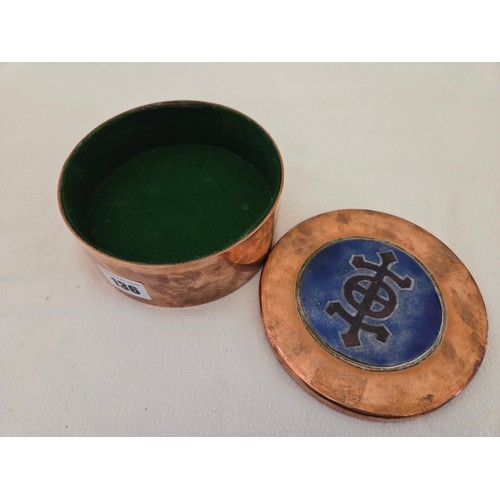 136 - Victorian cylindrical copper box with baize lined interior and Chi Rho enamelled emblem to the lid