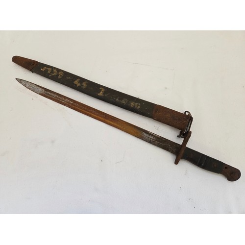 137A - A U.S. WWI 1917 bayonet by Remington, the ricasso stamped with date and maker's mark (rusted and in ... 