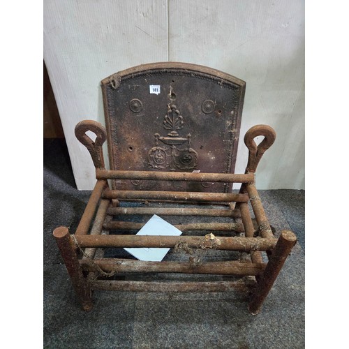 141 - Vintage cast iron dog grate and back plate