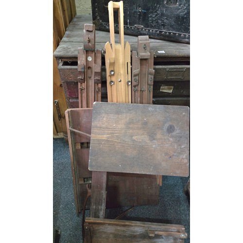 147 - Three artists easels incl. Winsor & Newton, the Cramore board etc