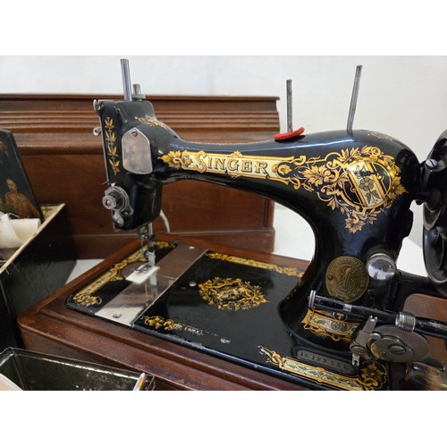 168 - Vintage cased Singer sewing machine and 2 tins of accessories