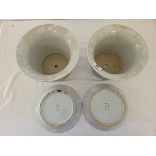 36 - Pair of Chinese floral chrysanemum jardinières and saucers signed to the base (one slightly taller t... 