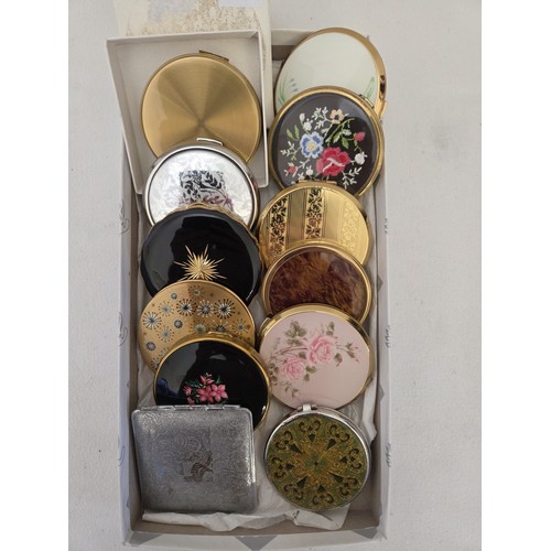Collection of 12 decorative powder compacts