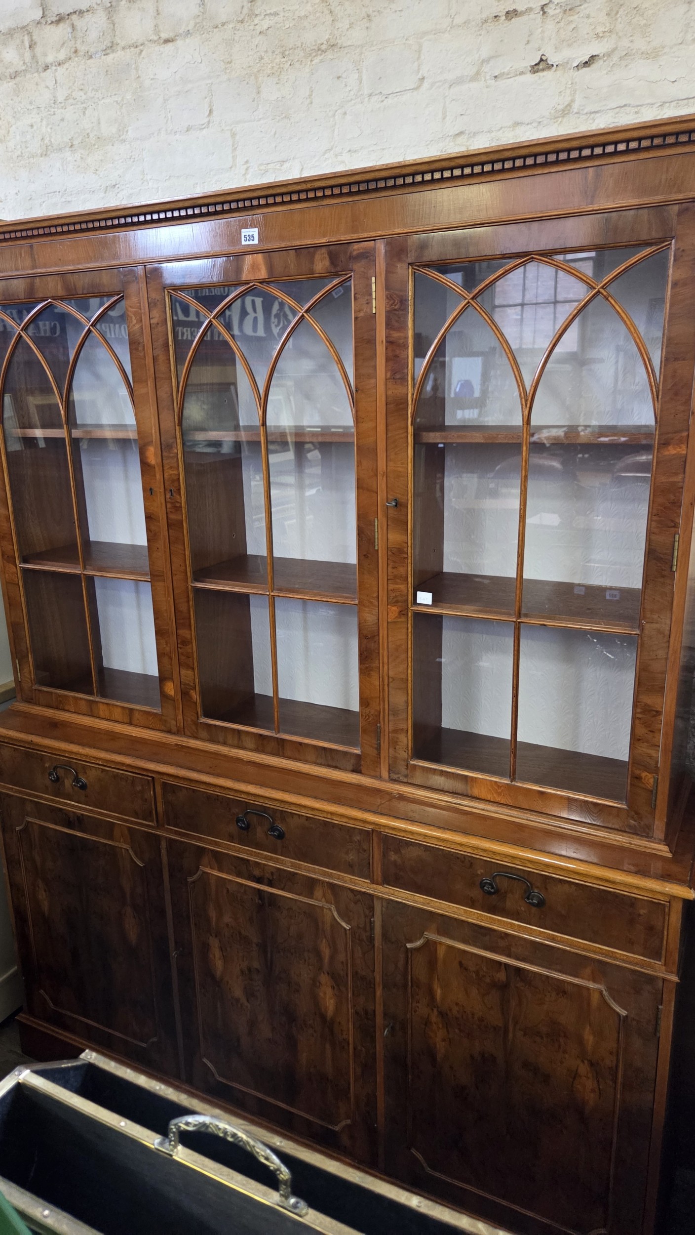 Yew side cabinet with upper Gothic arched glazed section with shelves ...