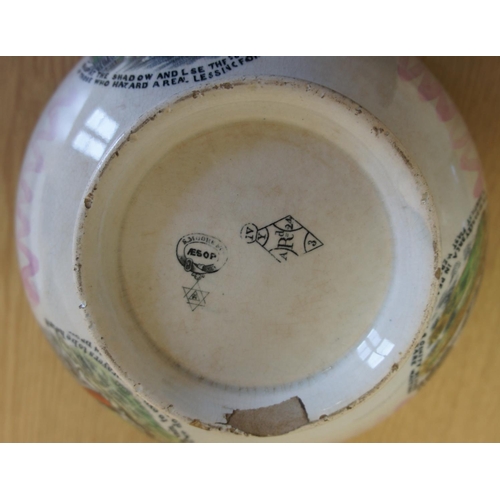 206 - A Southwick pottery lustre bowl transfer printed with six scenes from Aesops Fables, the base with d... 