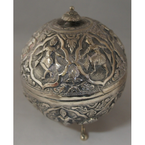 5 - A white metal far Eastern container, of globe form with finial, in two sections, finial squashed, we... 