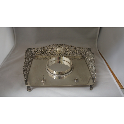 3 - A late Victorian silver ink stand by William Comyns, of rectangular form with three quarter pierced ... 