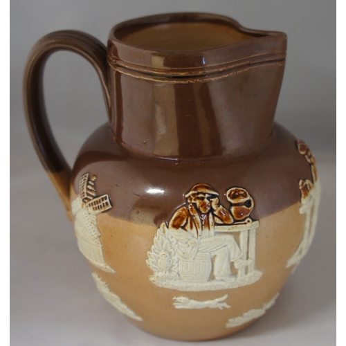 25 - A Royal Doulton stoneware jug, in two tone browns with applied motifs depicting country life, windmi... 