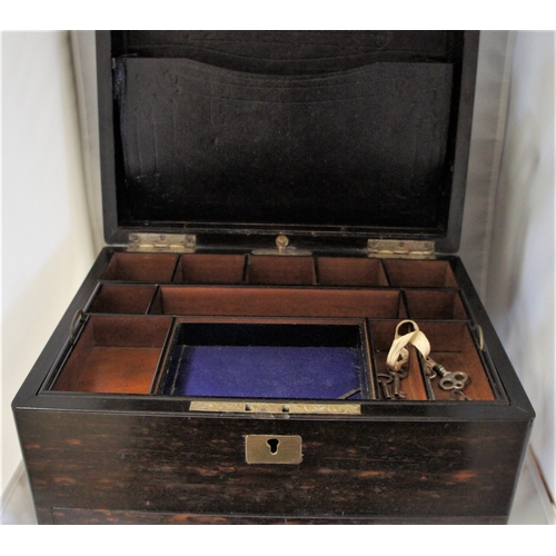 33 - A Rosewood work box, with fitted interior and secret drawer, 30 cm. wide.