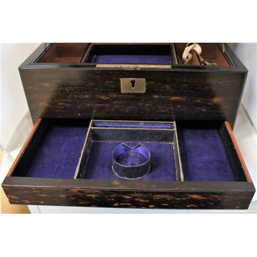 33 - A Rosewood work box, with fitted interior and secret drawer, 30 cm. wide.