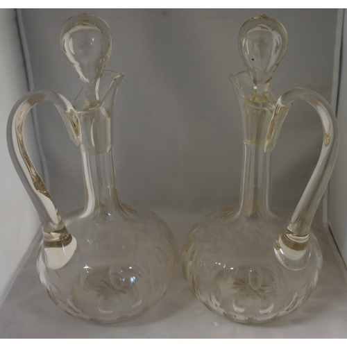 23 - Pair Staffs. dogs, pair Oriental style vases, pair decanters.