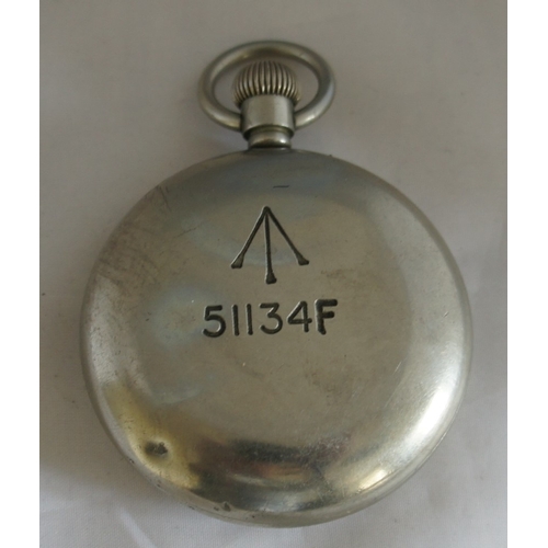 6 - A Nickel cased top winding Military pocket watch, the white enamel dial with Roman numerals and subs... 