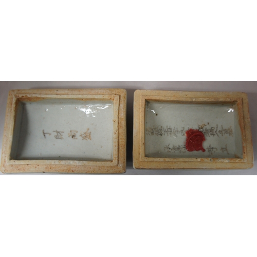 65 - Pair Oriental blue and white lided boxes, with extensive character marks, 10.5 x 7.5 cm.