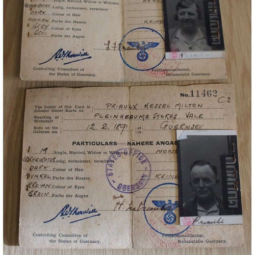 114 - Two German occupation identity cards.