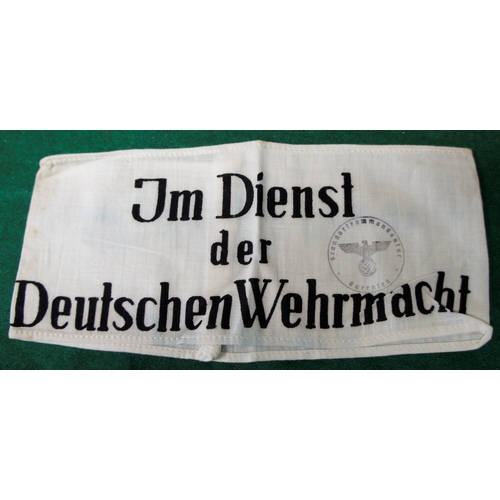 104 - A German WW 2 civilian worker armband printed in black 'Im Dienst der Deutschen Wehrmacht' (In servi... 