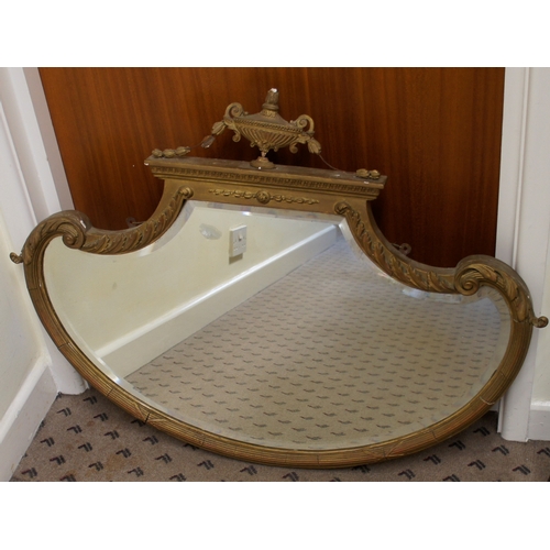 157 - Gilt and bevelled wall mirror.