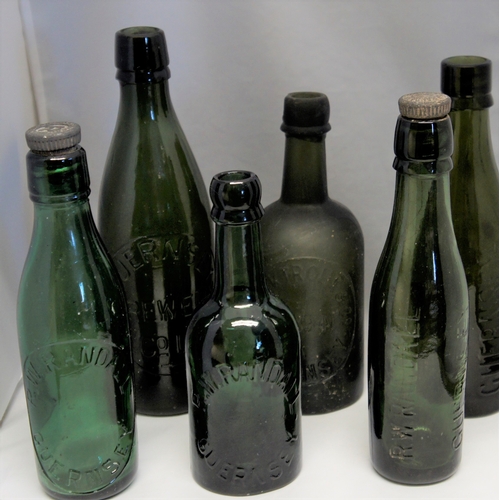 178 - Six glass beer bottles, four named R.W.Randall, Guernsey Brewery, Bucktrourt & Co. (6).