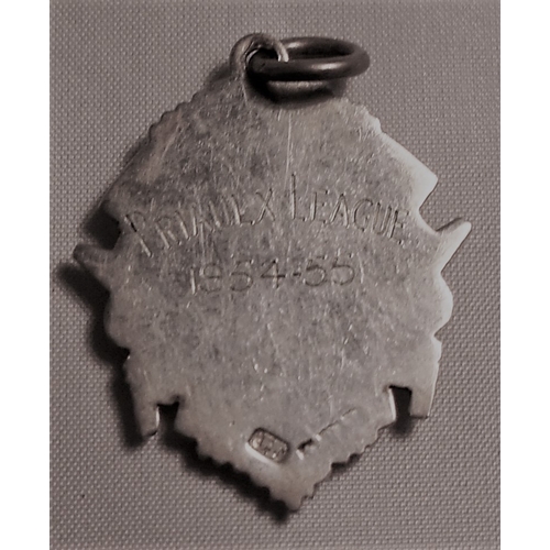 211 - A Guernsey Football Association silver medal, Priaulx League 1954-55.