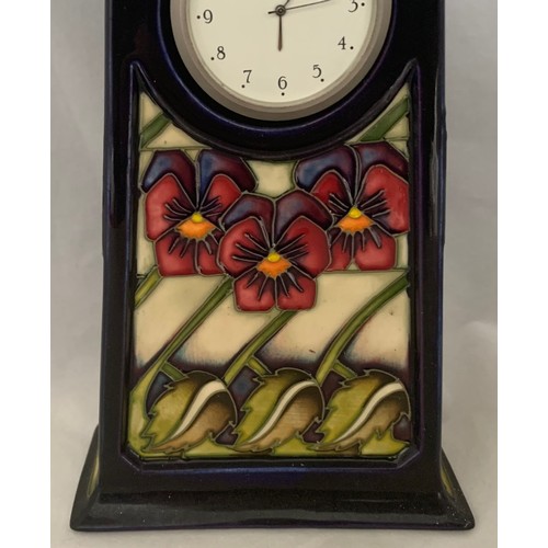 77 - Moorcroft pottery art nouveau style mantel clock, decorated in the Dames Pansy pattern, 23 cm high.