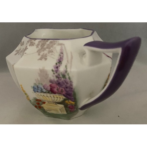 108 - Shelley 'Garden Urn' milk jug with hand painted decoration and purple trim, Registered design 723406... 