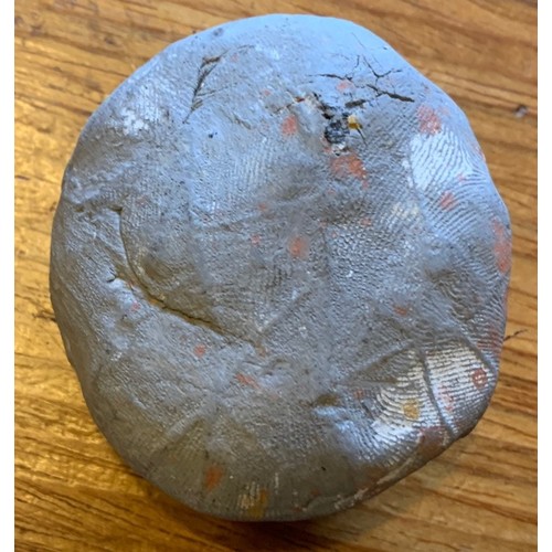 127 - Antique clay tablet, possibly from Tibet, depicting a seated Buddha, 5.5 x 5 cm.