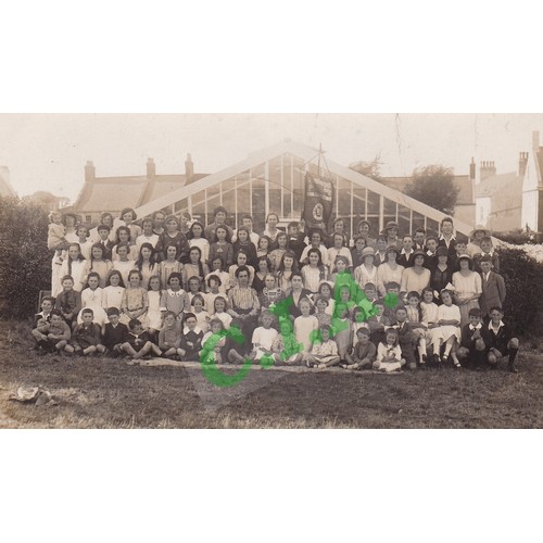 192 - Real photographic postcard, 'Young Leaguers' with banner, Guernsey.