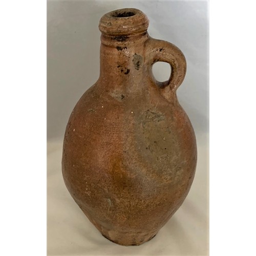 5 - Salt glazed wine flagon, with ring handle, some original glaze covering most of the flagon, 24.5 cm ... 