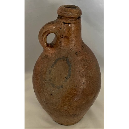 5 - Salt glazed wine flagon, with ring handle, some original glaze covering most of the flagon, 24.5 cm ... 