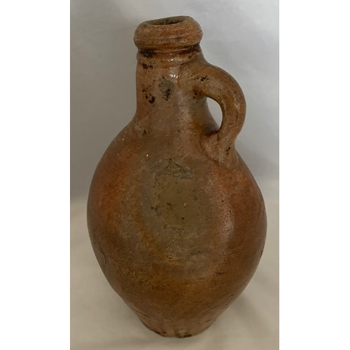 5 - Salt glazed wine flagon, with ring handle, some original glaze covering most of the flagon, 24.5 cm ... 