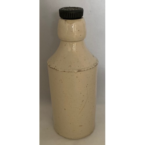 16 - Stoneware bottle, with black transfer, R.W.Randall Guernsey, with original internal thread screw sto... 
