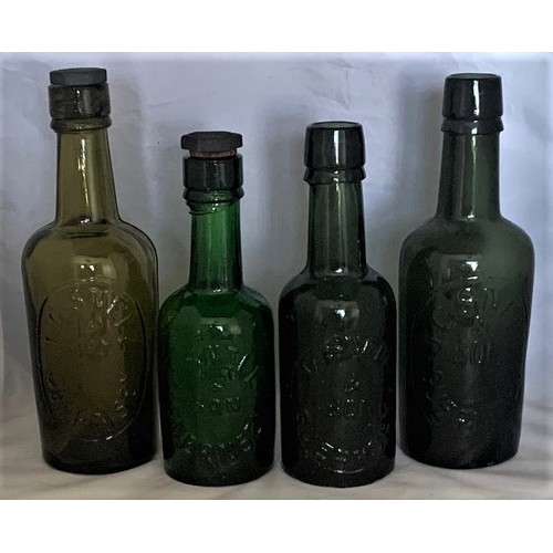 19 - Emerald green glass beer bottle by C.Snell & Son Guernsey, together with three others named Snell fa... 