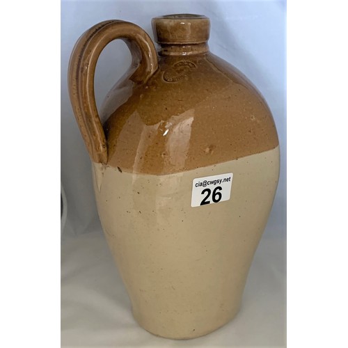 26 - Flat sided two tone flagon with strap handle, 30 cm high.