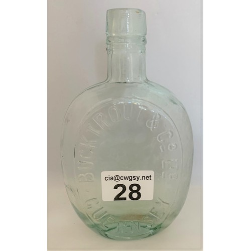 28 - Glass whisky bottle, Bucktrout & Co. Guernsey, 17 cm high.