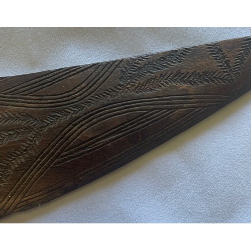 35 - Vintage Australian Boomerang with carved decoration, one tip missing (a/f), 54 cm wide.