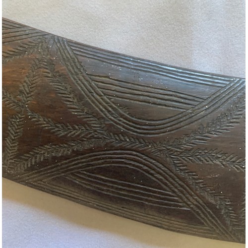 35 - Vintage Australian Boomerang with carved decoration, one tip missing (a/f), 54 cm wide.