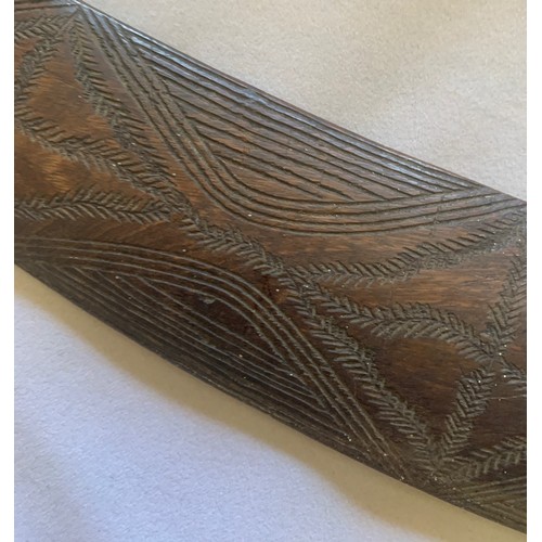 35 - Vintage Australian Boomerang with carved decoration, one tip missing (a/f), 54 cm wide.