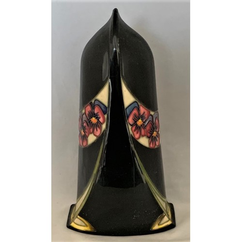 37 - Moorcroft Art Nouveau mantel clock decorated in the Dames Pansy design, 23 cm high.