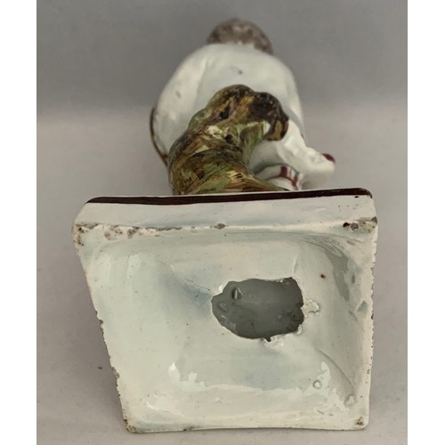 39 - Staffordshire pearlware figure circa 1840, with polychrome overglaze enamels, a boy carrying a bird'... 