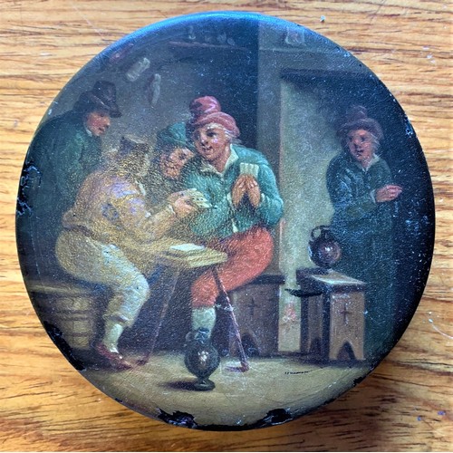 41 - Papier mache snuff box and cover, Dutch 19th century,  the circular top decorated  with a tavern int... 