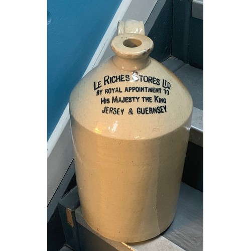 24 - Stoneware flagon, Le Riches Stores Jersey & Guernsey, 42 cm high.