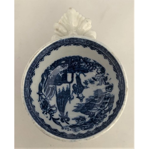 36 - A scarce Caughley English blue and white transfer-ware wine taster, circa 1790, decorated with the C... 