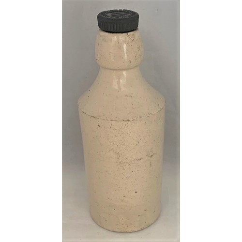 20 - R.W.Randall Guernsey Ginger Beer bottle, with original screw cap, 18.5 cm high (as found).