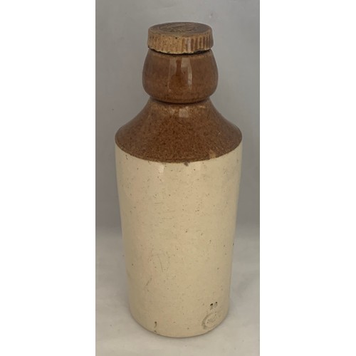 25 - An extremely rare  Royal Doulton two tone Ginger Beer bottle, inscribed 'Maker C.H.Newbury. Guernsey... 