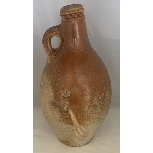 39 - German 18th century salt glazed stoneware flagon with ring handle, 36 cm high.