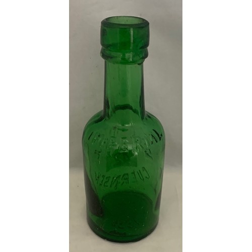 42 - W.J.Powell Guernsey Imperial, green glass beer bottle, 19 cm high.