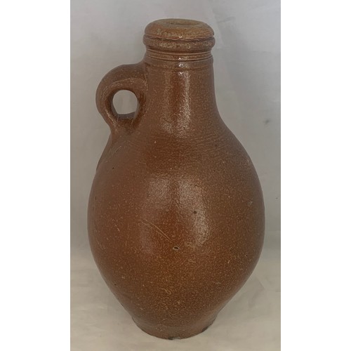 40 - German 18th century salt glazed flagon with ring handle, 30 cm high.