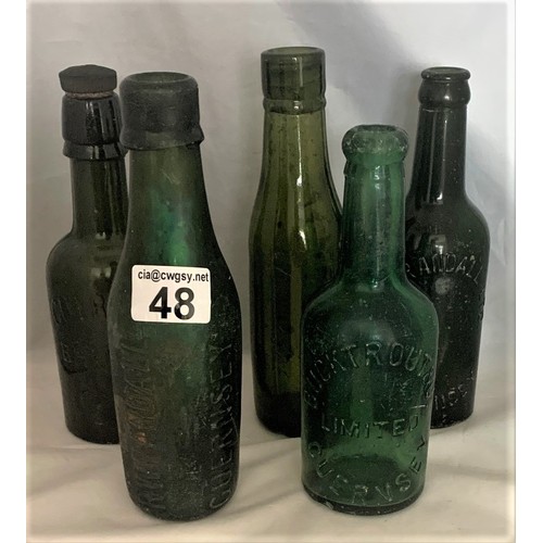 48 - Five coloured glass bottles, Guernsey Brewery, R.W.Randall and Bucktrout Guernsey  (5).