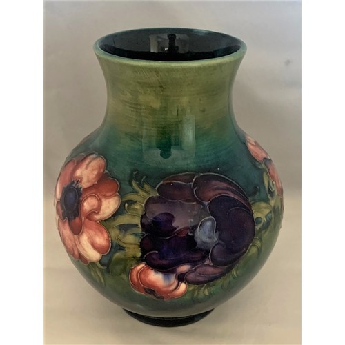 73 - Moorcroft Anemone pattern vase, of baluster form with graduated blue ground, 20 cm high.